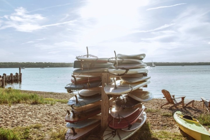 a boat sitting on top of a picnic table