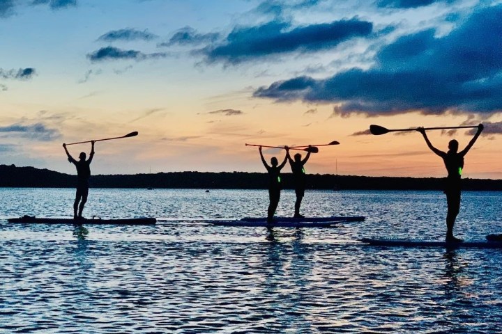 a sunset over a body of water