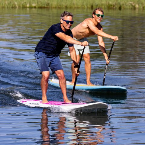 a person rowing a boat in the water