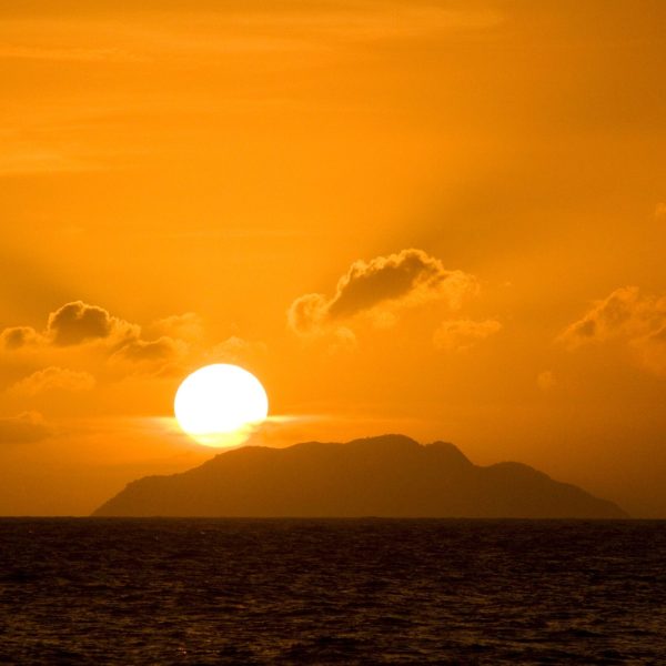 a sunset over a body of water