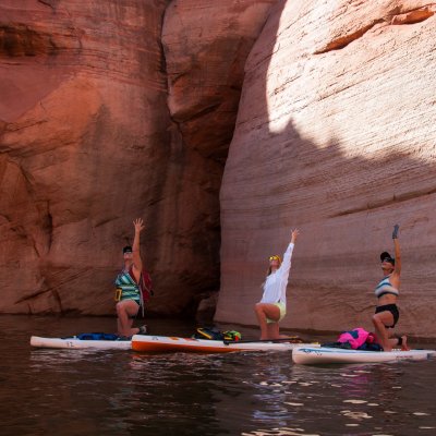a group of people lying on a raft