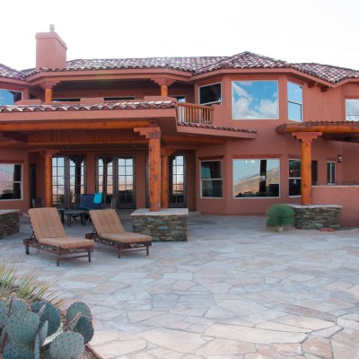 a chair sitting in front of a building